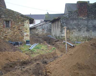 Image of trench being dug for fosse